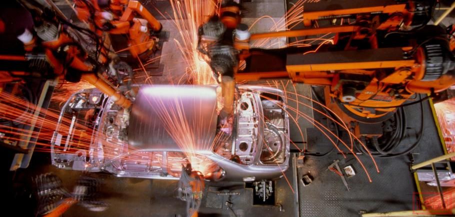 Car-assembly-line-robotic-welding-on-car-body-overhead-view.jpg