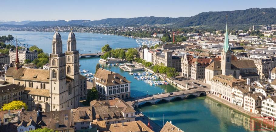 Zurich-old-town-by-the-Limmat-river-on-a-sunny-summer-day-in-Switzerland-largest.jpeg