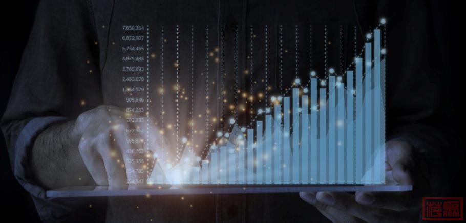 A-male-businessman-is-standing-by-a-tablet-analyzing-the-ongoing-upwards-of-the.jpeg