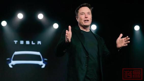 Tesla-Chef-Elon-Musk-spricht-vor-der-Enthullung-des-Modell-Y-in-Teslas-Designstu.jpeg