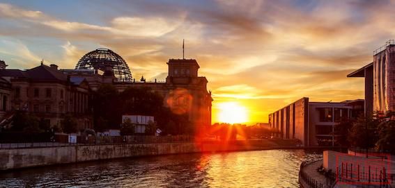 Reichstag-building-Berlin-near-Spree-river-in-a-nice-sunset.jpeg